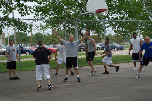 Team of deputies playing basketball for charity