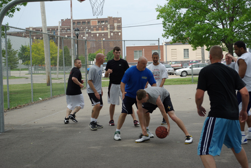 A group of Black Hawk County deputies playing basketball for charity