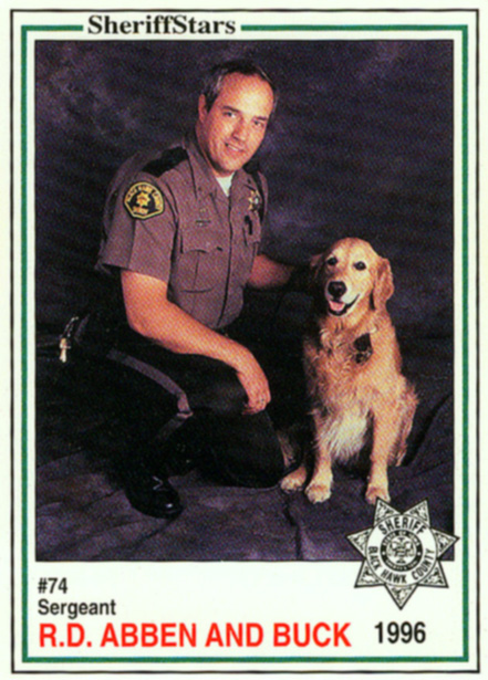 Sheriff Stars police card with Captain Abben and K9 Buck