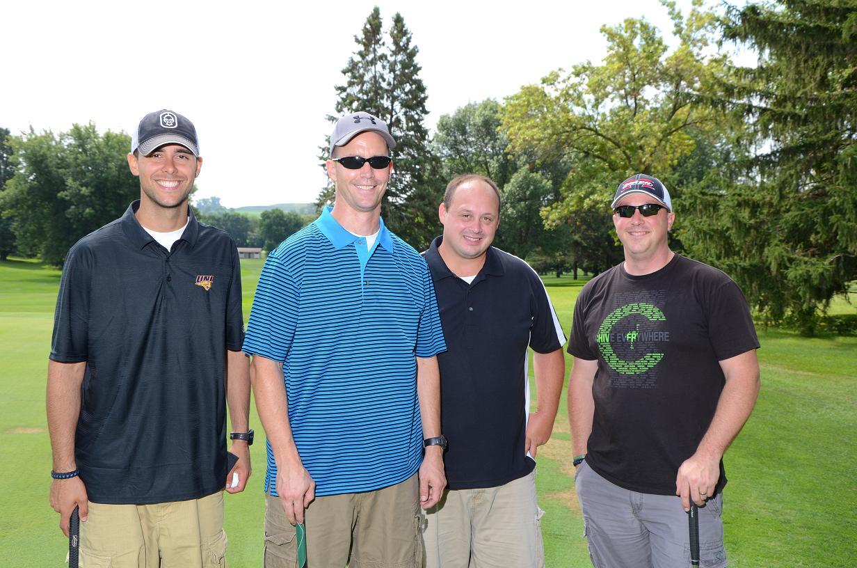 Group of men on the golf course together