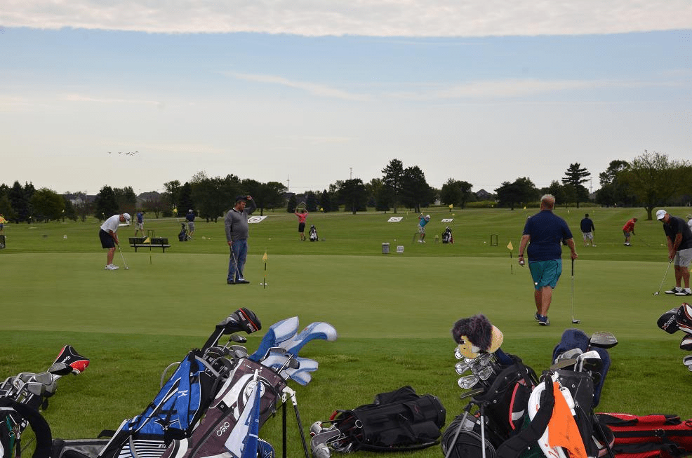 Group of people playing golf