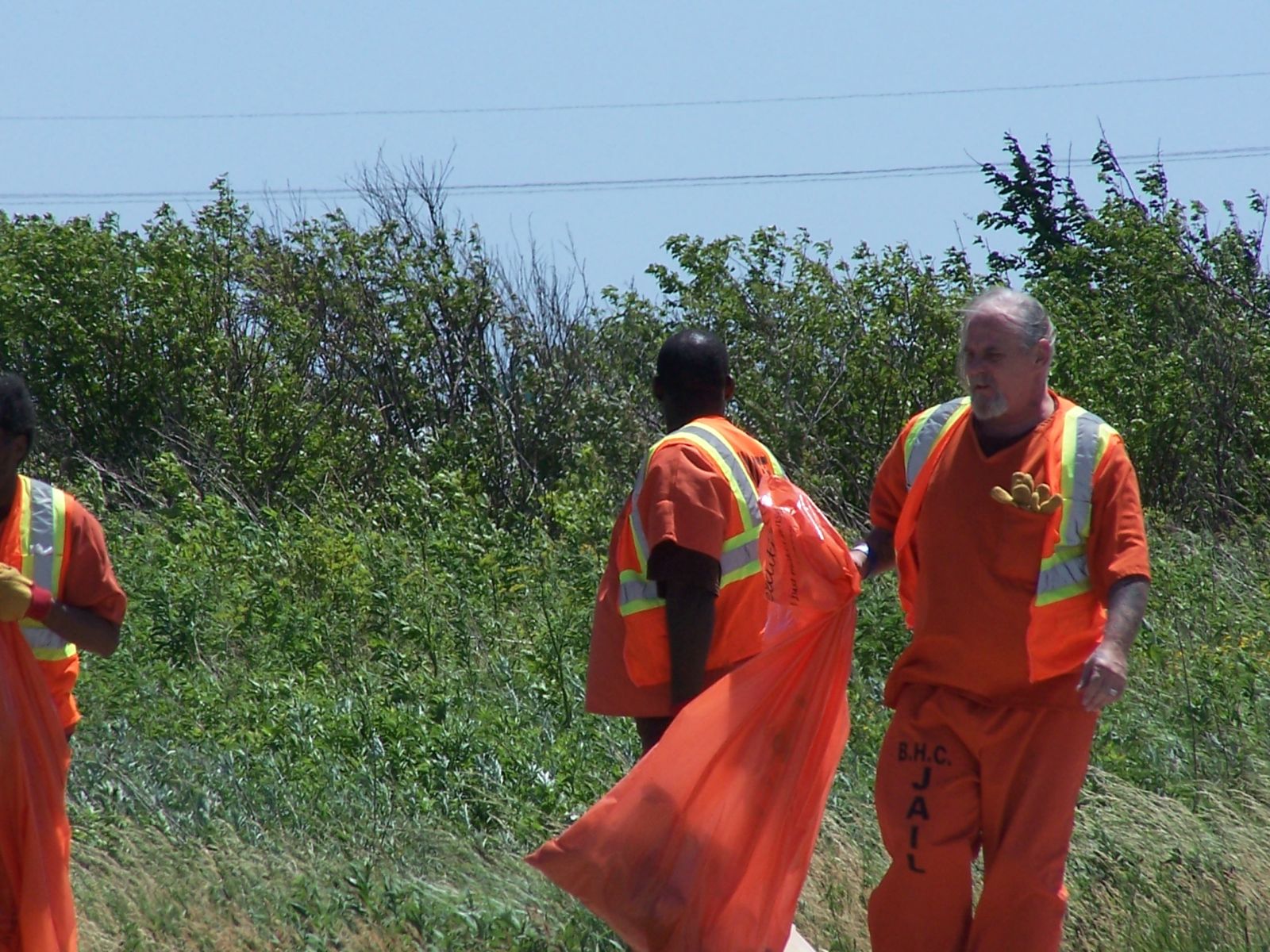 Inmates cleaning up the roadway