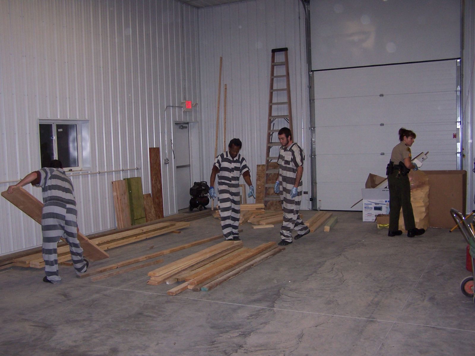 Group of inmates working at the shooting range