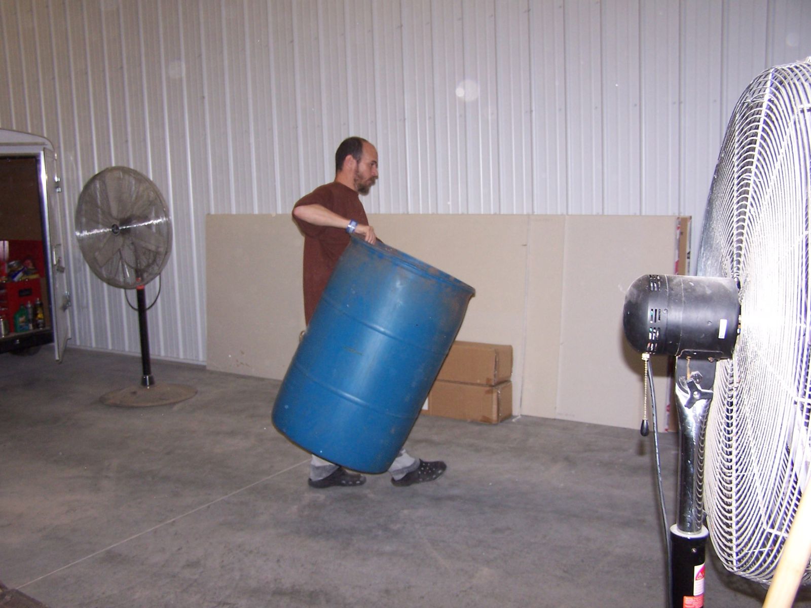 Inmate carrying barrel at the shooting range