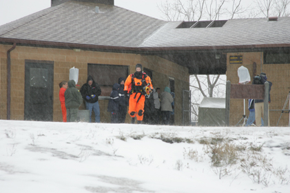 Men dressed in jail break theme to participate in polar plunge