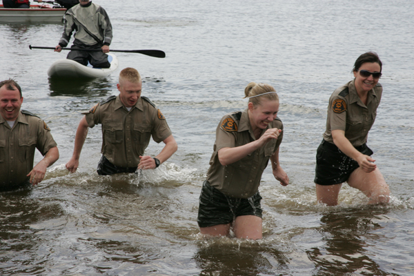 Deputies exiting the water after a polar plunge event